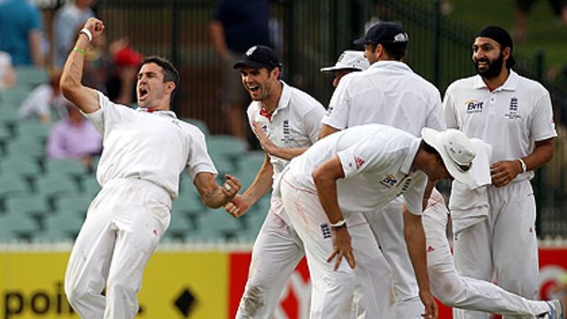 Kevin Pietersen celebrates as England takes a 1-0 lead in the Ashes series.