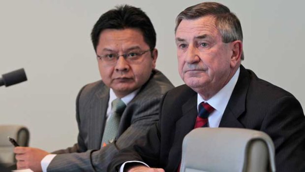 Huawei Chairman John Lord and executive David Wang.