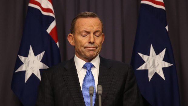 Prime Minister Abbott responds to Malcolm Turnbull's leadership challenge at Parliament House on Monday.