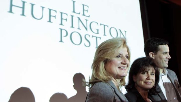 Women in sync &#8230; Anne Sinclair, editorial director of Le Huffington Post, second from right, speaks on Monday to the founder of the original Huffington Post, Arianna Huffington, left.