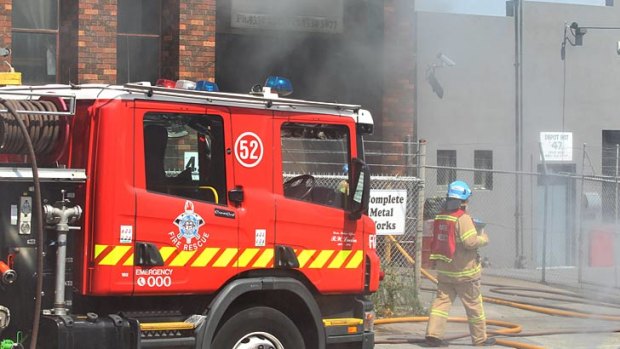 Fire fighters battle the blaze in Airport West