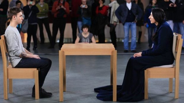 Eye-level art: Marina Abramovic at The Museum of Modern Art in 2010 performing <i>The Artist is Present</i>.