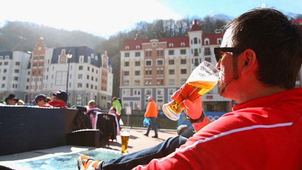 One spectator in Sochi found a way to enjoy a cleansing ale.