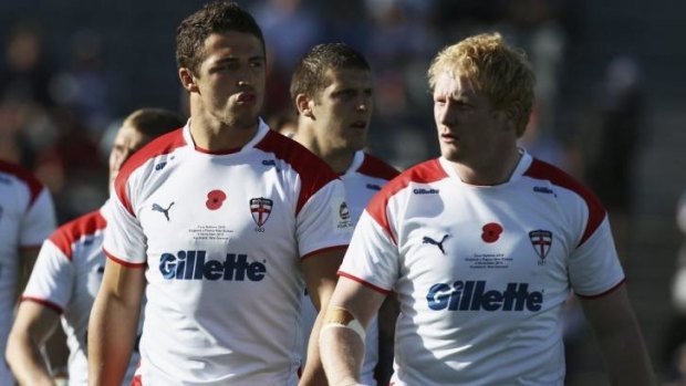 Friends and enemies: Sam Burgess and James Graham line up for England in 2010.