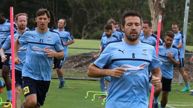 Strong finishers: Milos Dimitrijevic leads Sydney FC through their final training session on Thursday before their clash with Brisbane Roar.