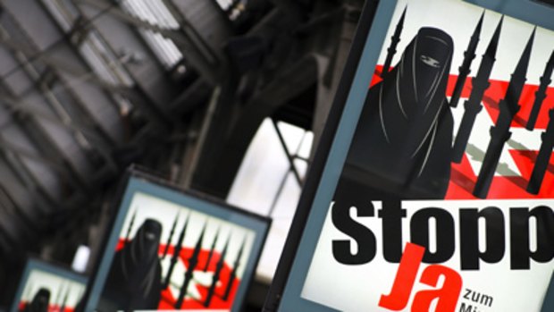 Posters of the far-right Swiss People's Party depicting a woman wearing a burqa.