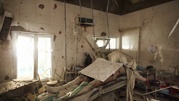 Andrew Quilty's photo, "The Man on the Operating Table", shows the body of Baynazar Mohammad Nazar, splayed lifeless on an operating table after a US airstrike in Kunduz, Afghanistan.