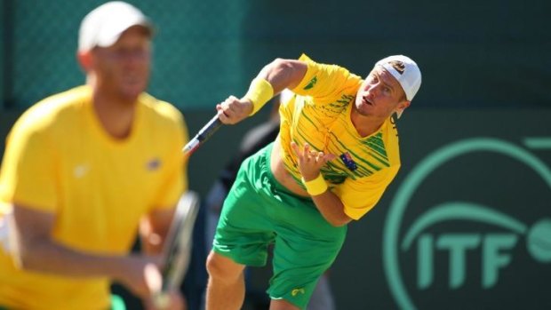 Hewitt, right, and Guccione cruised through the doubles to seal the tie for Australia.