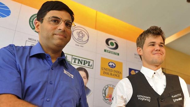 Got the moves: Reigning world chess champion India’s Viswanathan Anand, left and world's top-ranked player Norway's Magnus Carlsen.