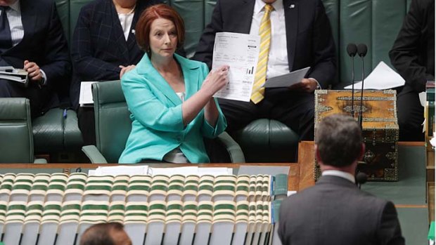 Prime Minister Julia Gillard makes a point to Tony Abbott about the bill.