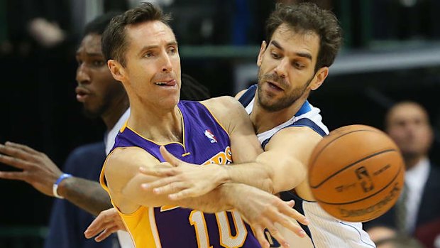 LA Lakers veteran Steve Nash passes the ball away from Dallas point guard Jose Calderon.