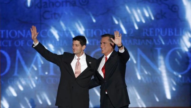 Republican presidential nominee Mitt Romney waves to the crowd with vice-presidential running mate Paul Ryan after accepting the nomination during the final session of the Republican National Convention in Tampa, Florida.