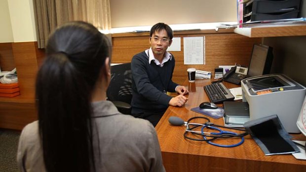 Sixteen GPs is not enough &#8230; Dr Kwok Wan sees a patient at the busy Kildare Road Medical Centre, Blacktown.