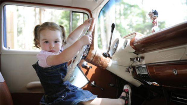 A day after her second birthday, Olivia McCarthy took her parent's 1957 Chevrolet for a spin.
