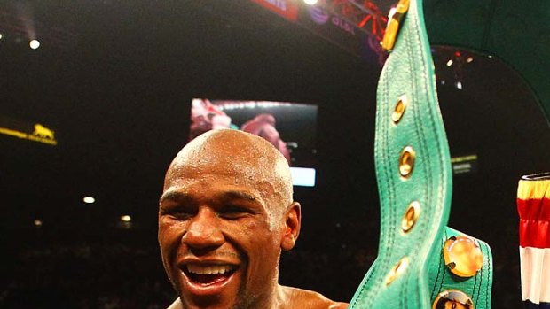 The champion ... Floyd Mayweather Jr. .