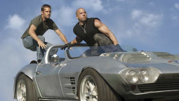 Paul Walker, left, and Vin Diesel in Fast & Furious 5.