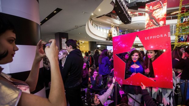 Thousands queue up the opening of the new Sephora store at Melbourne Central.