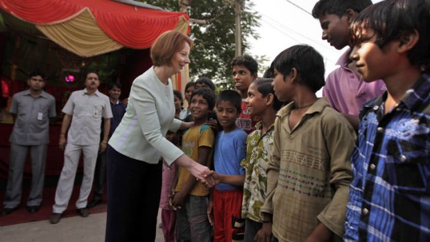 PM Julia Gillard visits Asha, which helps educate slum children.