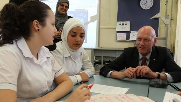 Minister for School Education, Peter Garrett  visits in a year 11 class at Macarthur Girls High School on Monday.