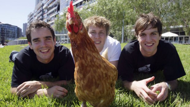 Josh O'Meara, Andrew Fincher and Christopher Wright with the chicken.