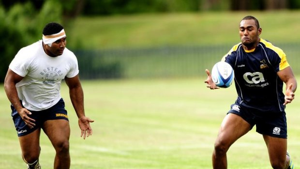 The ACT Brumbies train at the club's headquarters in Griffith, Canberra. New backline recruit Tevita Kuridrani (right) and prop Jerry Yanuyanutawa.