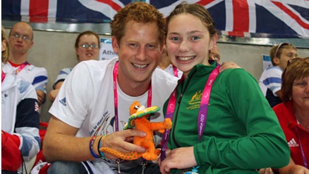 Royal approval ... Prince Harry with Maddison Elliott.