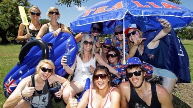 A group of friends celebrate Australia day at New Farm Park.