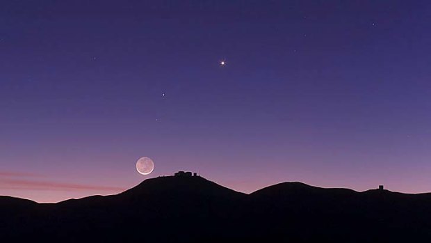 The crescent Moon and earthshine over Eureopean Southern Observatory's Paranal Observatory in Chile.