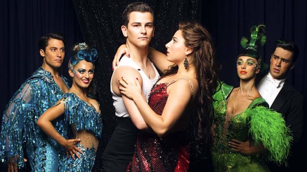 Stepping out: Thomas Lacey as Scott and Phoebe Panaretos as Fran with other cast members of <em>Strictly Ballroom the Musical</em>.