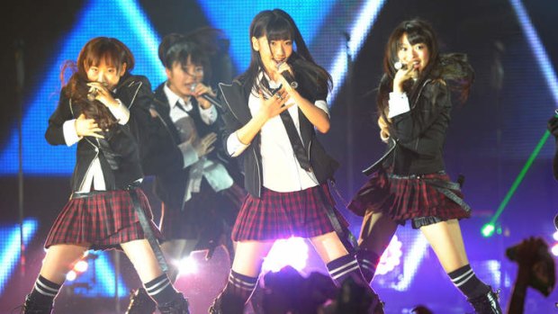 Top performers ... AKB48 perform during a concert in 2011.