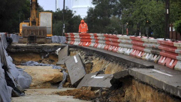 Weather dramas ... part of a Vaucluse road collapsed.