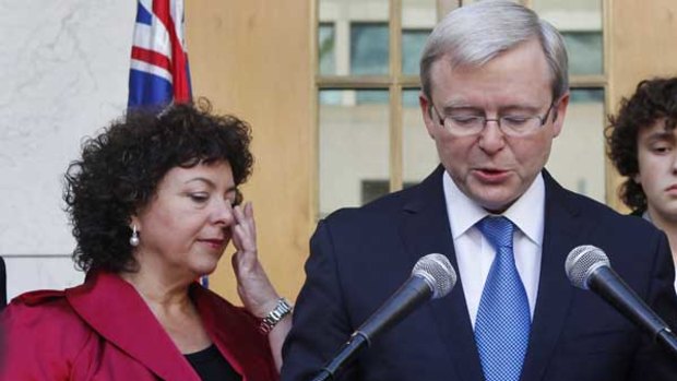 Kevin Rudd holds a press conference with wife Therese Rein and their children.