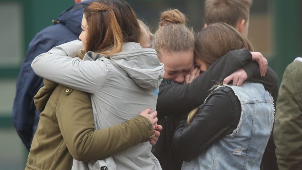 Students at the Joseph-Koenig-Gymnasium high school mourn their friends who were killed in the Germanwings crash.