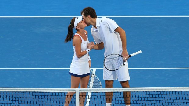 Agnieszka Radwanska and Jerzy Janowicz of Poland celebrate after they secured their place in the final of the Hopman Cup