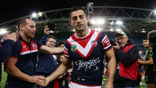 Standing tall: Anthony Minichiello walks from the field for the final time as an NRL player.