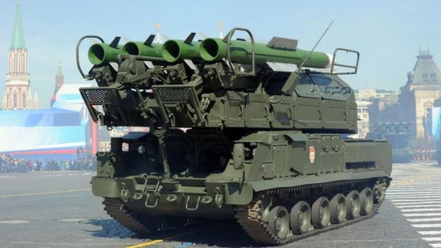 This file picture shows a Russia's air defence system Buk-2M armoured launcher vehicle at the Red Square in Moscow during Victory Day parade on May 9, 2013.