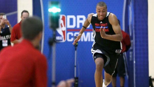 Dante Exum participates in the three-quarters-court sprint in the 2014 NBA basketball draft combine last Friday.