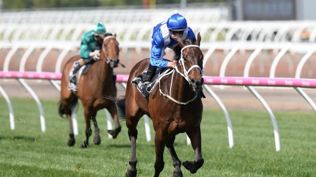 Jockey Hugh Bowman guides mighty mare Winx to victory in the Turnbull Stakes.