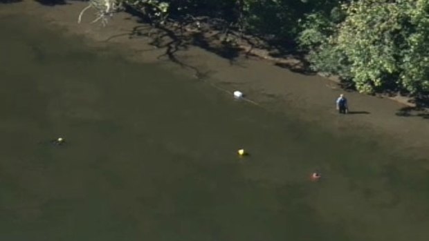 Police are searching for a vehicle with a child inside which has been submerged in the Hawkesbury River. 