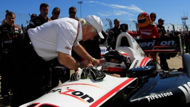 Captain’s pick: Roger Penske, pictured with driver Will Power in October, hopes to buy or partner an Australian V8 team. 