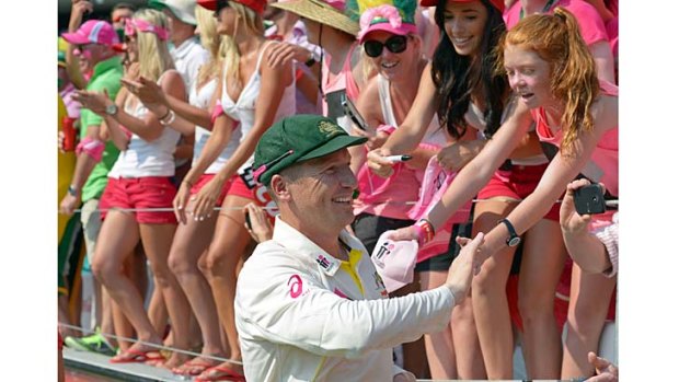 Brad Haddin talks to spectators during a lap of honour after the Test ended.