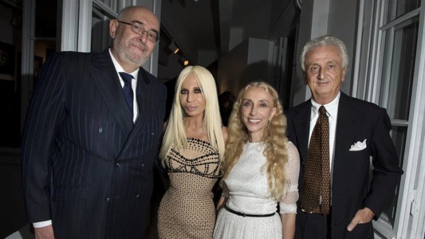 Rob Langtry, Donatella Versace, Franca Sozzani and Fabrizio Servente at the When Wool Is In Fashion exhibition at the opening day of Milan Fashion Week.