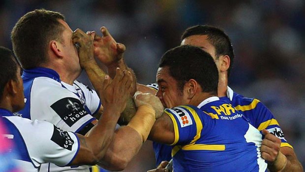 Itchy and scratchy ... Hayne and Payne go toe to toe.