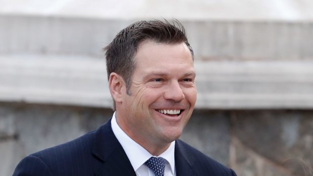 FILE - In this Nov. 20, 2016 file ;photo, Kansas Secretary of State, Kris Kobach is seen in Bedminster, N.J. President Donald Trump is expected to sign an executive order launching a commission to review alleged voter fraud and voter suppression in the U.S. election system, three White House officials said. Kobach and Vice President Mike Pence will lead the commission, which will look at allegations of improper voting and fraudulent voter registration in states and across the nation. (AP Photo/Carolyn Kaster, File)