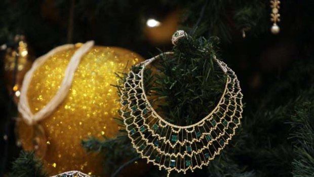Jewellery decorates an $11m Christmas tree at the Emirates Palace hotel in the Emirati capital Abu Dhabi.