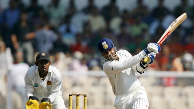 Virender Sehwag plays a typically flamboyant stroke during his unbeaten knock of 284.