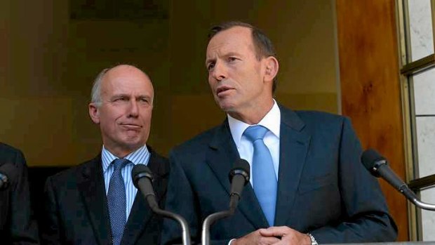 Senator Eric Abetz and Prime Minister Tony Abbott. The government is finalising plans for a sweeping review of the nation's workplace laws.