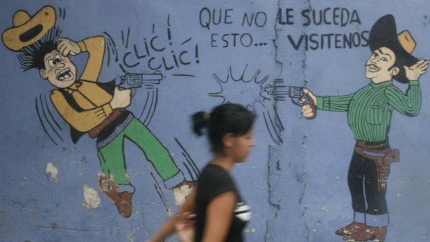 San Pedro Sula ... the graffiti reads, ''Hopefully, this will not happen to you.''