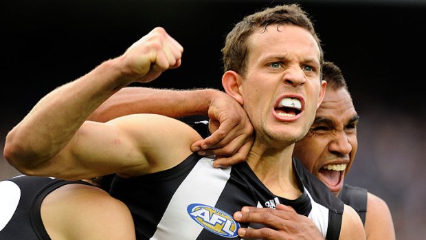 Collingwood's Luke Ball celebrates a goal in the last quarter against West Coast. The Pies' form has cost bookies a fortune.