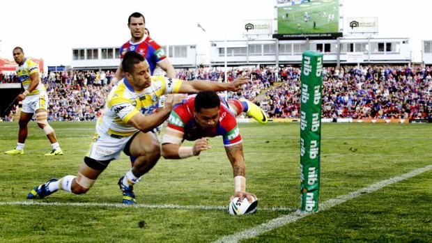 No surprises: Newcastle's Joey Leilua scores in the corner on the way to a big win for the Knights.